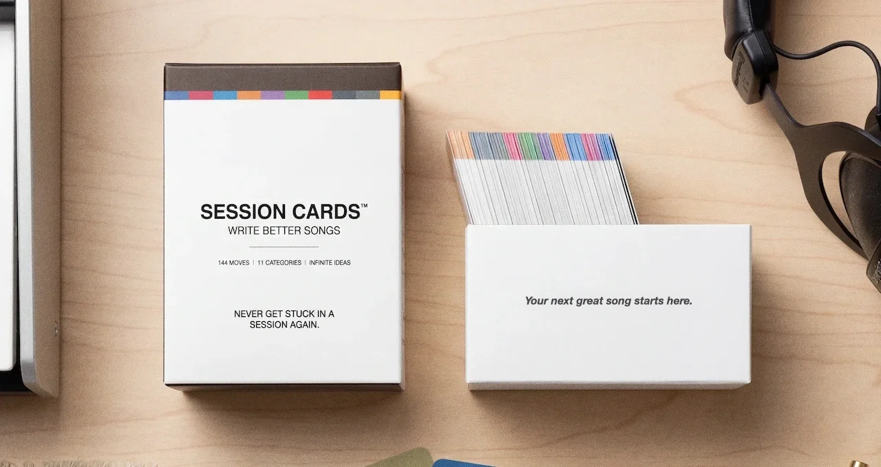Session Cards box open with cards fanned out on desk